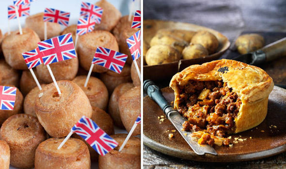 A plate of pork pies with little Union Jack flags and a small minced meat pie
